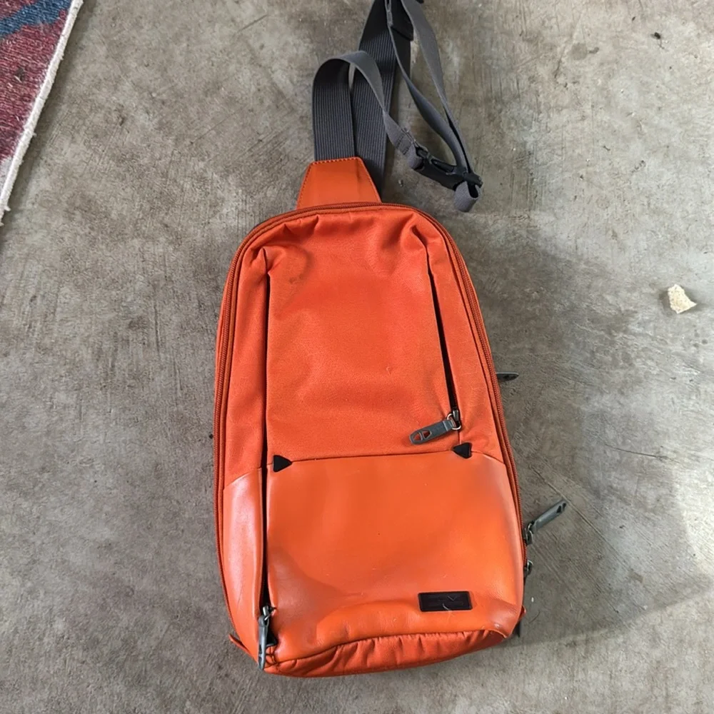 Time Tahoe Marshall sling bag in orange